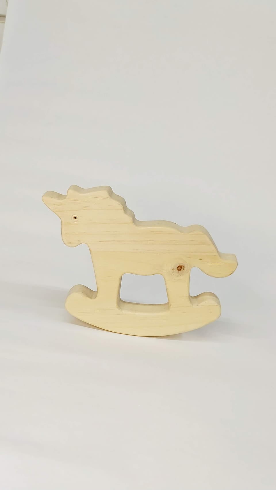 Unicornio balancín de madera