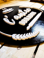 Logotipo personalizado en madera, detalle