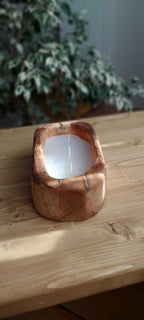Vela de coco en madera reciclada, vista superior