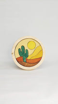Puzzle de madera redondo con cactus y sol