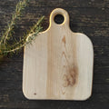 Tabla de cocina de madera con formas orgánicas